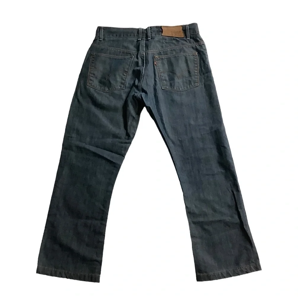 Levi’s 562 Men’s Red Tab Boot Cut Fit Blue Jeans Size 32 / 28